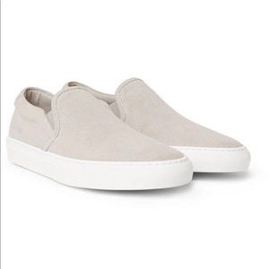 woman by common projects slides 37